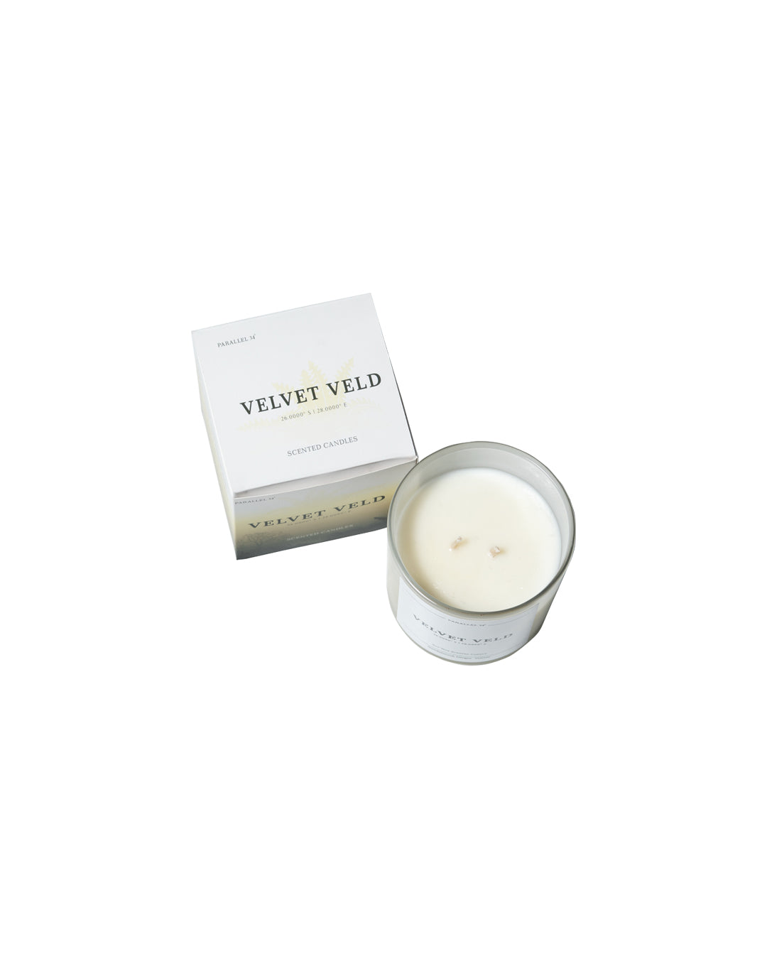 Natural soy candle burning in modern living room