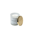 Natural soy candle burning in modern living room