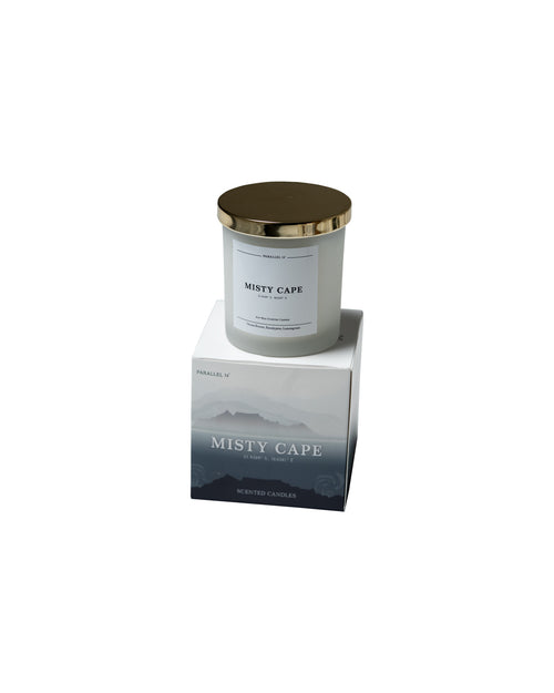 Scented Candle with gold lid on a white background